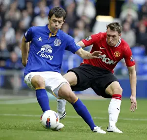 29 October 2011, Everton V Manchester United Prints: Phil Jones vs Diniyar Bilyaletdinov: A Clash of Talents at Goodison Park