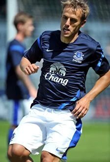 Images Dated 14th July 2012: Phil Neville in Action: Everton FC's Pre-Season Friendly Against Morecambe at Globe Arena