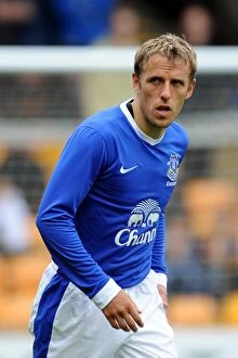 Images Dated 21st July 2012: Phil Neville in Action: Everton vs. Motherwell - Pre-Season Friendly at Fir Park Stadium