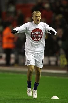 Images Dated 13th March 2012: Phil Neville: Everton vs. Liverpool Rivalry at Anfield, Barclays Premier League (13 March 2012)