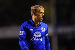 Images Dated 10th March 2012: Phil Neville: Leading Everton at Goodison Park Against Tottenham Hotspur in the Barclays Premier