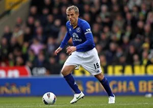 Images Dated 8th April 2012: Phil Neville Leads Everton at Carrow Road: Everton vs. Norwich City
