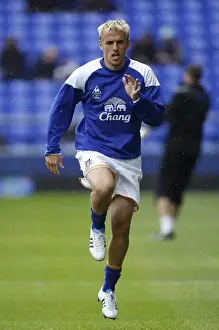 Framed Print : Phil Neville Leads Everton at Goodison Park Against Wigan Athletic, Barclays Premier League (September 17, 2011) Framed Print : Phil Neville Leads Everton at Goodison Park Against Wigan Athletic, Barclays Premier League (September 17, 2011)