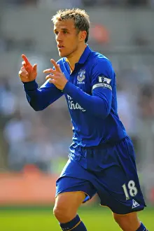Framed Print : Phil Neville Leads Everton at Swansea City's Liberty Stadium in Barclays Premier League (24 March 2012) Framed Print : Phil Neville Leads Everton at Swansea City's Liberty Stadium in Barclays Premier League (24 March 2012)