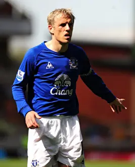 09 April 2011 Wolverhampton Wanderers V Everton Prints: Phil Neville Leads Everton's Charge Against Wolverhampton Wanderers in the Barclays Premier League (09 April 2011)
