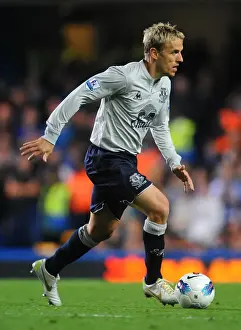 15 October 2011 Chelsea V Everton Prints: Phil Neville vs. Chelsea: Everton's Fierce Face-Off at Stamford Bridge (15 October 2011)