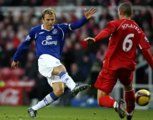 Phil Neville vs Emanuel Pogatetz: A Premier League Showdown at Riverside Stadium (08/09)