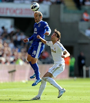 Swansea City 0 V Everton 3 : Liberty Stadium : 22-09-2012 Prints: Phil Neville vs Miguel Michu: Everton's 3-0 Victory over Swansea City (Barclays Premier League)
