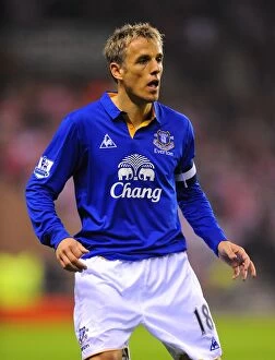Images Dated 27th March 2012: Phil Neville's Battle: Everton vs. Sunderland in FA Cup Sixth Round Replay at Stadium of Light