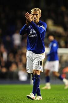 Images Dated 11th January 2012: Phil Neville's Emotional Tribute: Everton Fans Unwavering Support Celebrated at White Hart Lane