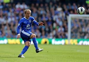 Images Dated 1st September 2012: Phil Neville's Lead: Everton's 2-0 Victory Over West Bromwich Albion (Premier League, September 1)