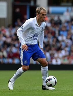 Images Dated 25th August 2012: Phil Neville's Leadership: Everton's Triumph over Aston Villa (3-1, 25-08-2012)