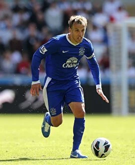 Images Dated 22nd September 2012: Phil Neville's Triumphant Moment: Everton's 3-0 Victory over Swansea City (September 22, 2012)