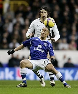Images Dated 30th November 2008: Pienaar vs. Corluka: A Football Battle at White Hart Lane - Everton vs. Tottenham, November 2008
