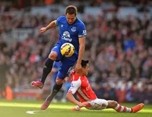 Framed Print : Premier League: Jagielka Tackles Sanchez in Intense Arsenal vs. Everton Clash Framed Print : Premier League: Jagielka Tackles Sanchez in Intense Arsenal vs. Everton Clash