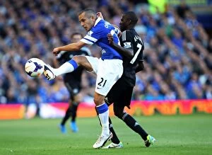 Images Dated 14th September 2013: Ramires vs Osman: A Battle at Goodison Park - Everton vs Chelsea (1-0 in Favor of Chelsea)