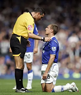 Referee Andre Marriner Confers with Everton's Phil Jagielka during Everton vs Blackburn Rovers, Barclays Premier League (2008)