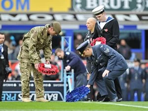 Images Dated 14th November 2010: Remembrance Day Tribute at Goodison Park: Everton vs. Arsenal - Soldiers Honor Fallen Heroes with
