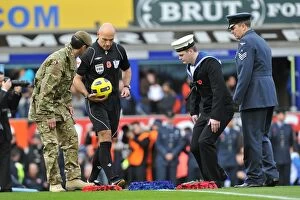 Images Dated 14th November 2010: Remembrance Sunday at Goodison Park: Everton and Arsenal Players Honor Fallen Heroes Before