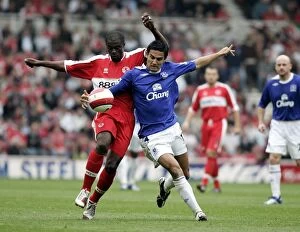 Middlesbrough v Everton Gallery: The Riverside Stadium - Middlesbroughs George Boateng and Evertons Tim Cahill in action