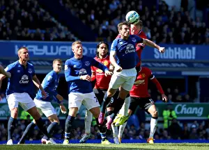 Rooney vs. Baines: A Premier League Showdown at Goodison Park