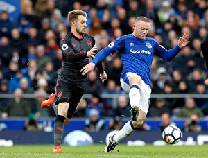 Premier League Prints: Rooney vs. Ramsey: Intense Battle for the Ball at Goodison Park - Premier League: Everton vs