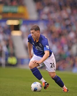 Images Dated 20th August 2011: Ross Barkley in Action: Everton vs. Queens Park Rangers, Premier League Rivalry at Goodison Park