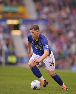 Ross Barkley in Action: Everton vs. Queens Park Rangers, Premier League Rivalry at Goodison Park (2011)