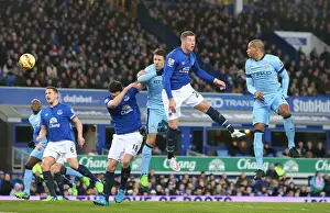 Framed Print : Ross Barkley Goes Airborne: Everton vs Manchester City Clash at Goodison Park Framed Print : Ross Barkley Goes Airborne: Everton vs Manchester City Clash at Goodison Park