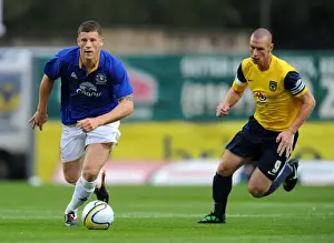 Framed Print : Ross Barkley vs James Constable: A Pre-Season Battle at Kassam Stadium (2011)