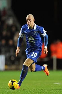 Images Dated 22nd December 2013: Ross Barkley's Game-Winning Goal: Everton's Triumph over Swansea City in the Barclays Premier League