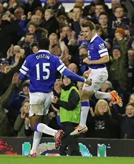 Seamus Coleman and Sylvain Distin: Everton's Unstoppable Duo Celebrate Second Goal Against Fulham (14-12-2013, Goodison Park)