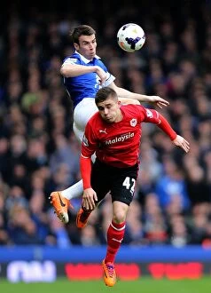 Images Dated 15th March 2014: Seamus Coleman vs. Declan John: A Battle for the Ball in Everton's 2-1 Victory over Cardiff City