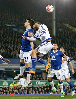 Seamus Coleman vs Diego Costa: Aerial Battle in the Emirates FA Cup Quarterfinal at Goodison Park (Everton vs Chelsea)