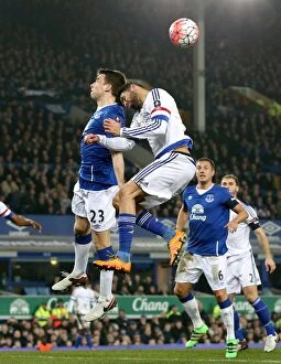 Emirates FA Cup - Everton v Chelsea - Quarter Final - Goodison Park Collection: Seamus Coleman vs Diego Costa: Aerial Battle in the Emirates FA Cup Quarterfinal at Goodison Park
