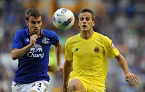 Pre-Season Friendly Prints: Seamus Coleman vs. Javier Camunas: A Battle at Goodison Park - Everton vs