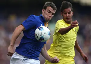 Pre-Season Friendly Prints: Seamus Coleman vs. Joan Oriol: A Clash of Wings at Goodison Park (2011) - Everton vs