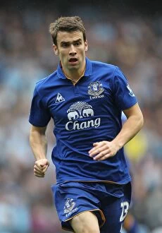 Images Dated 24th September 2011: Seamus Coleman vs Manchester City: Everton's Defender Faces Off in the Barclays Premier League