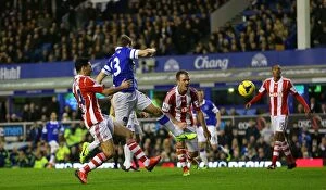 Images Dated 30th November 2013: Seamus Coleman's Strike: Everton's Second Goal in Dominant 4-0 Victory over Stoke City (Nov 30)