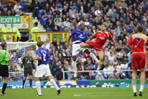 Soaring High: Joseph Yobo's Dominant Height Over Portsmouth in Everton FC