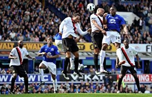 Images Dated 7th May 2011: Soaring Victor: Anichebe's Aerial Battle - Everton vs Manchester City, May 2011