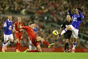 Images Dated 28th January 2014: Steven Gerrard vs. Steven Pienaar: Intense Rivalry in the Liverpool-Everton Barclays Premier