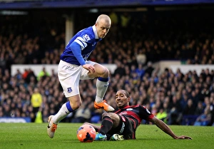 FA Cup Prints: Steven Naismith vs. Karl Henry: Everton's Dominance over Queens Park Rangers in FA Cup Third Round (4-0)