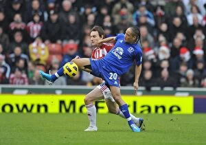 Images Dated 4th January 2011: Steven Pienaar vs. Dean Whitehead: A Tactical Showdown in the Premier League - Everton vs