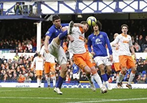 Images Dated 18th February 2012: Stracqualursi vs Wilson: A FA Cup Battle at Everton's Goodison Park