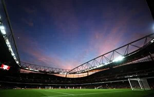 Arsenal 1 v Everton 1 : Emirates Stadium : 08-12-2013 Collection: Sunset Duel: Arsenal vs. Everton at Emirates Stadium (1-1)