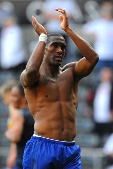 24 March 2012 v Swansea City, Liberty Stadium Collection: Sylvain Distin Salutes Everton Fans After Dramatic Swansea Victory (24 March 2012)