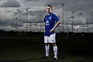 Images Dated 30th September 2010: Tenacious Midfielder: Leon Osman's Unyielding Spirit in Everton Football Club