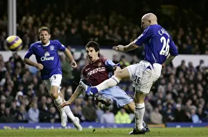 Tense Moment: Lee Carsley's Shot Amidst Ridgewell's Pressure at Goodison Park, Everton vs Aston Villa, FA Barclays Premiership, 11/11/06