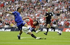 Images Dated 19th April 2009: Tevez Threatens: Everton vs Manchester United FA Cup Semi-Final - A Stunning Showdown at Wembley
